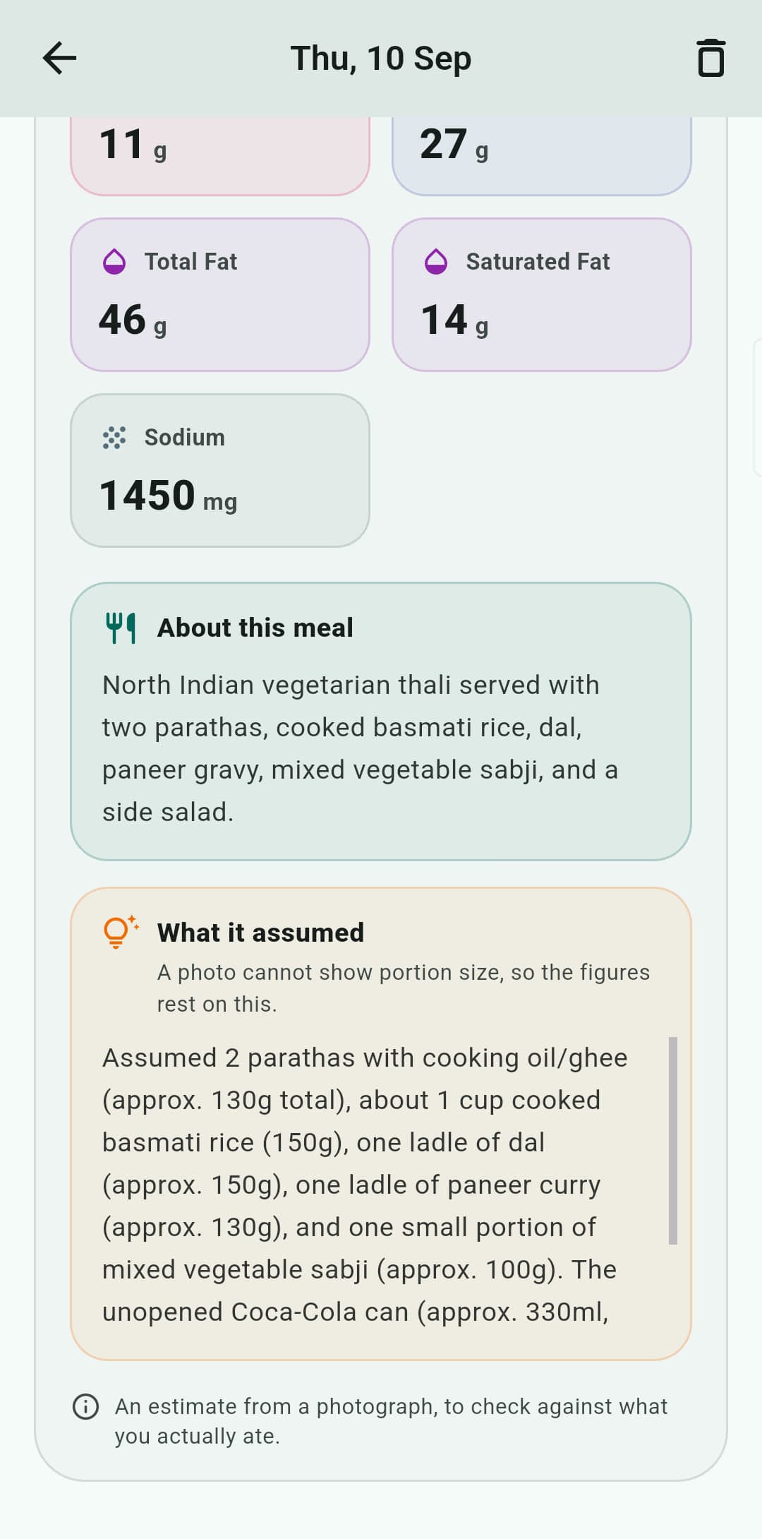 The bottom of a meal estimate, headed “What it assumed”: a note that a photograph cannot show portion size so the figures rest on assumptions, the portions it assumed for each item, and a closing line reading “An estimate from a photograph, to check against what you actually ate.”